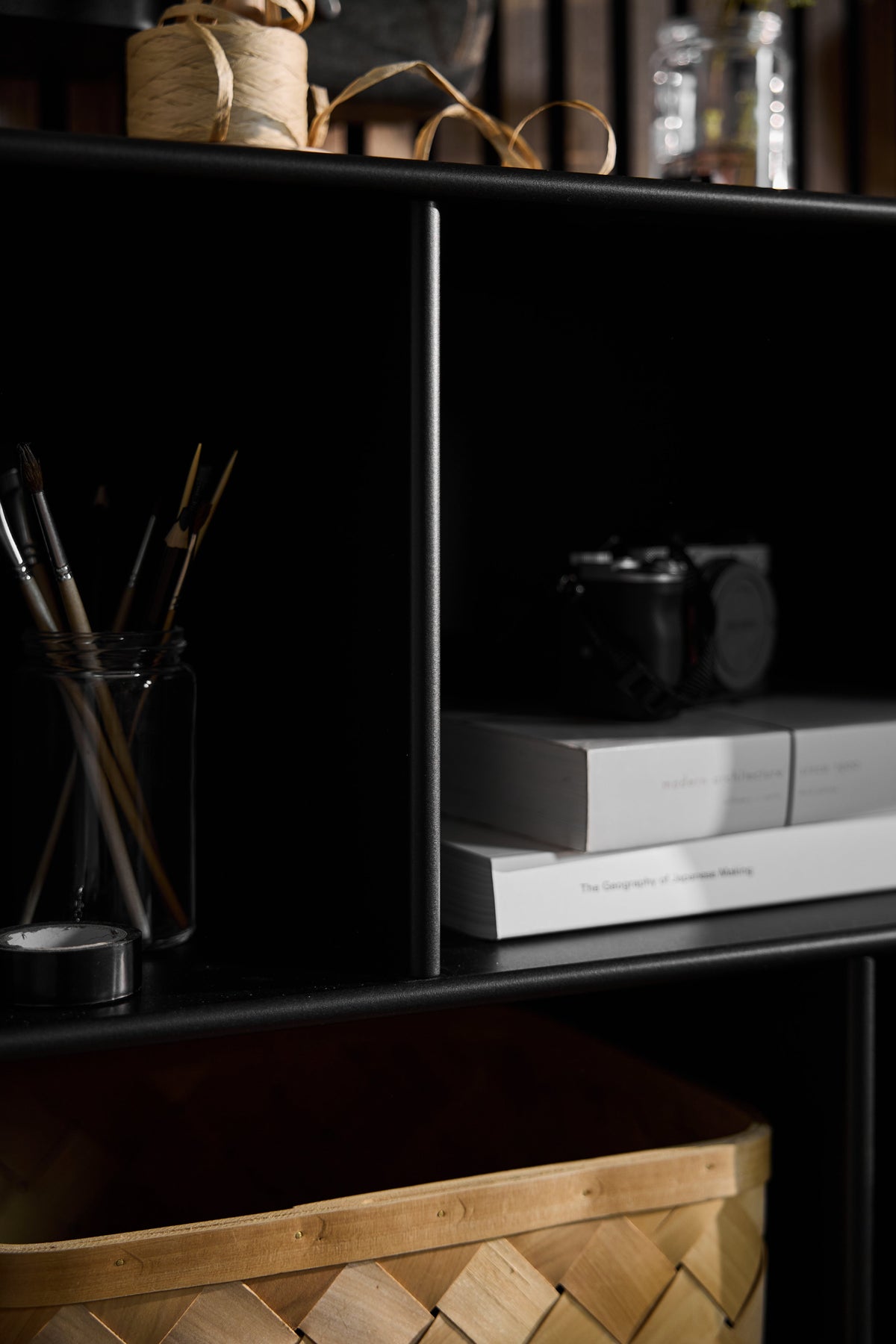 Arka Open Cabinet in black lifestyle setting