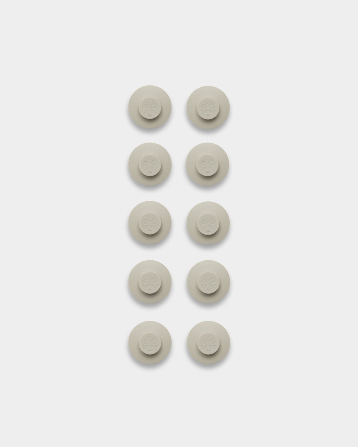 Ten light beige Dupps, accessory for hanging posters and frames on Akupanel acoustic panels