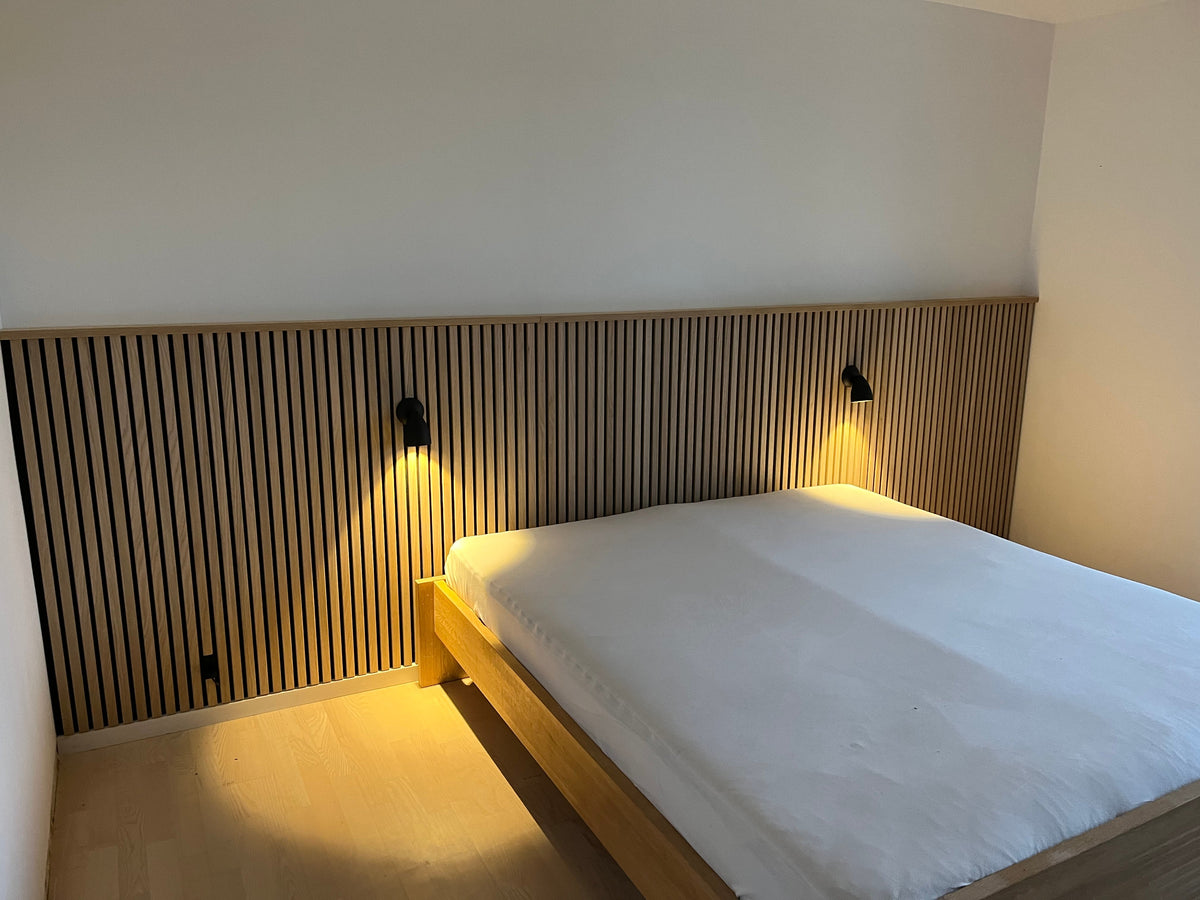 Akupanel slat panel headboard in Classic Oak with black felt
